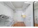 Organized walk-in closet with shelving, hanging rods, and storage baskets, maximizing space at 4808 N 24Th St # 806, Phoenix, AZ 85016