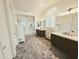 Open bathroom with double sinks, expansive walk-in shower, and abundant counter space at 5304 S Wesley S Cir, Mesa, AZ 85212