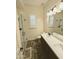 Bathroom featuring double sinks, a shower, and a toilet at 5304 S Wesley S Cir, Mesa, AZ 85212