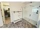 Modern bathroom with a glass-enclosed shower, spacious layout, and modern fixtures at 5304 S Wesley S Cir, Mesa, AZ 85212