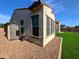 Exterior view of the property with a shed, artificial turf, and gravel landscaping providing a serene outdoor space at 5304 S Wesley S Cir, Mesa, AZ 85212
