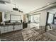 Open concept floorplan showcasing the living room, kitchen, and backyard access at 5304 S Wesley S Cir, Mesa, AZ 85212