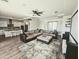 Spacious living room showcasing an open floor plan and ample natural light at 5304 S Wesley S Cir, Mesa, AZ 85212