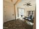Bright home office with a ceiling fan, desk space, and a large window providing natural light at 5304 S Wesley S Cir, Mesa, AZ 85212