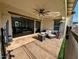 Relaxing covered patio area with stylish furniture and an open view of the backyard at 5304 S Wesley S Cir, Mesa, AZ 85212