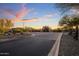 Community entrance featuring desert landscaping and architectural features at 537 E Balao Dr, Phoenix, AZ 85085
