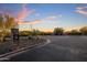 Community entrance featuring desert landscaping and architectural features at 537 E Balao Dr, Phoenix, AZ 85085