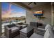 Covered outdoor patio with mountain views and a clear view to the backyard pool at 537 E Balao Dr, Phoenix, AZ 85085