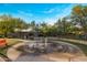Community park with splash pad and lush landscaping providing a recreational space at 537 E Balao Dr, Phoenix, AZ 85085