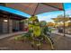 Vibrant community playground featuring modern play structures, seating, and shaded areas at 537 E Balao Dr, Phoenix, AZ 85085