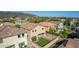 An aerial view showcases a private backyard with artificial turf and low-maintenance landscaping at 5423 W Yearling Rd, Phoenix, AZ 85083