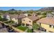 Aerial view features a private backyard with turf and low-maintenance landscaping, surrounded by a community at 5423 W Yearling Rd, Phoenix, AZ 85083
