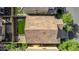 An aerial view of a private backyard with artificial turf, patio, and privacy fence at 5423 W Yearling Rd, Phoenix, AZ 85083