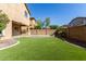 This home has an artificial turf backyard that is perfect for pets or recreation at 5423 W Yearling Rd, Phoenix, AZ 85083