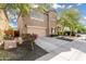Two-story home featuring an attached two-car garage, meticulous landscaping, and inviting curb appeal at 5423 W Yearling Rd, Phoenix, AZ 85083