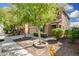 Two-story home featuring an attached two-car garage, meticulous landscaping, and inviting curb appeal at 5423 W Yearling Rd, Phoenix, AZ 85083