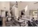 Spacious living room with staircase, open layout, and modern interior design elements at 5423 W Yearling Rd, Phoenix, AZ 85083