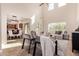 Bright and spacious living room featuring high ceilings, neutral tones, and an open-concept design at 5423 W Yearling Rd, Phoenix, AZ 85083