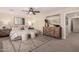 Relaxing primary bedroom showcasing natural light, stylish decor, and a comfortable ambiance at 5423 W Yearling Rd, Phoenix, AZ 85083