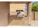 The outdoor kitchen features a built-in grill and is great for backyard entertaining at 5423 W Yearling Rd, Phoenix, AZ 85083