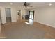 Large bedroom with wood flooring, a ceiling fan, and access to the pool at 5718 N 72Nd Pl, Scottsdale, AZ 85250
