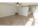 Spacious bonus room showcasing a white board and sliding barn doors to the kitchen at 5718 N 72Nd Pl, Scottsdale, AZ 85250