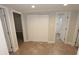Neutral hallway with access to additional rooms at 5718 N 72Nd Pl, Scottsdale, AZ 85250