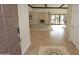 Spacious living room with tile flooring, fireplace, and sliding glass doors to the backyard at 5718 N 72Nd Pl, Scottsdale, AZ 85250
