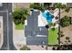 Aerial view of a well-maintained home features a private pool and verdant landscaping at 5751 E Ludlow Dr, Scottsdale, AZ 85254