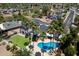 Beautiful bird's eye view of a home with a private pool and lush tropical landscaping at 5751 E Ludlow Dr, Scottsdale, AZ 85254