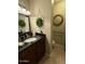 Bathroom with a custom sink, fixtures, and decor at 5751 E Ludlow Dr, Scottsdale, AZ 85254