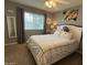 Bedroom with a ceiling fan and natural lighting at 5751 E Ludlow Dr, Scottsdale, AZ 85254