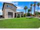 Charming two-story home with well-maintained lawn, mature trees, and a side-entry garage at 5751 E Ludlow Dr, Scottsdale, AZ 85254