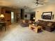 Expansive living room with comfortable seating, a built-in entertainment unit, and neutral decor at 5751 E Ludlow Dr, Scottsdale, AZ 85254