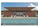 Modern bungalows with a refreshing pool, outdoor lounge seating, and sleek architectural design at 6228 N Cattle Track Rd, Scottsdale, AZ 85250