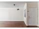 Bright living room featuring hardwood floors and modern lighting fixtures at 750 E Northern Ave # 1089, Phoenix, AZ 85020