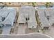 Bird's eye view of a well-maintained home with a tile roof, desert landscaping, and a private driveway at 8021 E Jasmine St, Mesa, AZ 85207