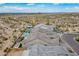 Breathtaking aerial shot showcases luxury homes each with pools and desert landscaping, blending natural beauty with modern living at 8021 E Jasmine St, Mesa, AZ 85207