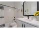 Charming bathroom with a tub-shower combo and a sleek vanity, perfect for relaxation at 8021 E Jasmine St, Mesa, AZ 85207