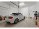 Clean, well-lit garage with door opener at 8021 E Jasmine St, Mesa, AZ 85207