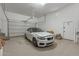 Spacious garage with epoxy floor, and door opener at 8021 E Jasmine St, Mesa, AZ 85207