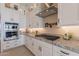 Beautiful kitchen with white cabinetry, stainless steel appliances, and granite countertops at 8021 E Jasmine St, Mesa, AZ 85207