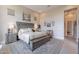 Well-lit main bedroom with neutral tones, stylish furniture, and an open layout at 8021 E Jasmine St, Mesa, AZ 85207