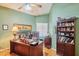 Functional home office featuring a large desk, ample storage, and natural light at 8242 S Kachina Dr, Tempe, AZ 85284