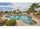 Backyard pool with lush landscaping, featuring a desert tropical oasis at 8242 S Kachina Dr, Tempe, AZ 85284