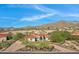 Expansive desert property featuring mature trees, a paver driveway, and mountain views at 8540 E Mcdowell Rd # 10, Mesa, AZ 85207