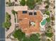 Overhead shot of a custom home showing a pool, courtyard, solar panels, and desert landscaping at 8540 E Mcdowell Rd # 10, Mesa, AZ 85207