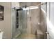 Modern bathroom features a spacious glass walk-in shower with multiple shower heads and tile surround at 8540 E Mcdowell Rd # 10, Mesa, AZ 85207