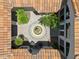 Aerial shot of a courtyard featuring lush landscaping and a calming water feature at 8540 E Mcdowell Rd # 10, Mesa, AZ 85207