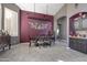 Elegant dining room with stylish light fixtures, ample seating, and tasteful decor at 8540 E Mcdowell Rd # 10, Mesa, AZ 85207